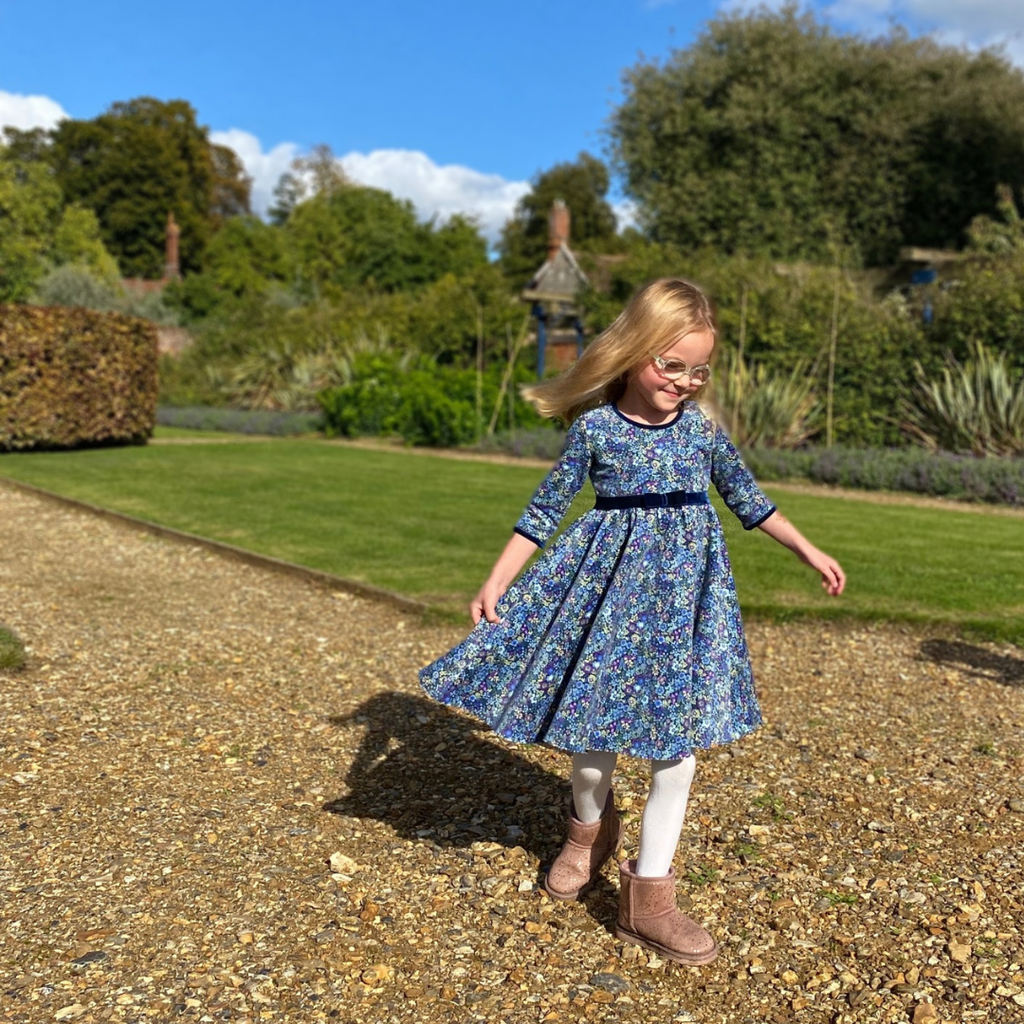 Little girl twirling dresses best sale